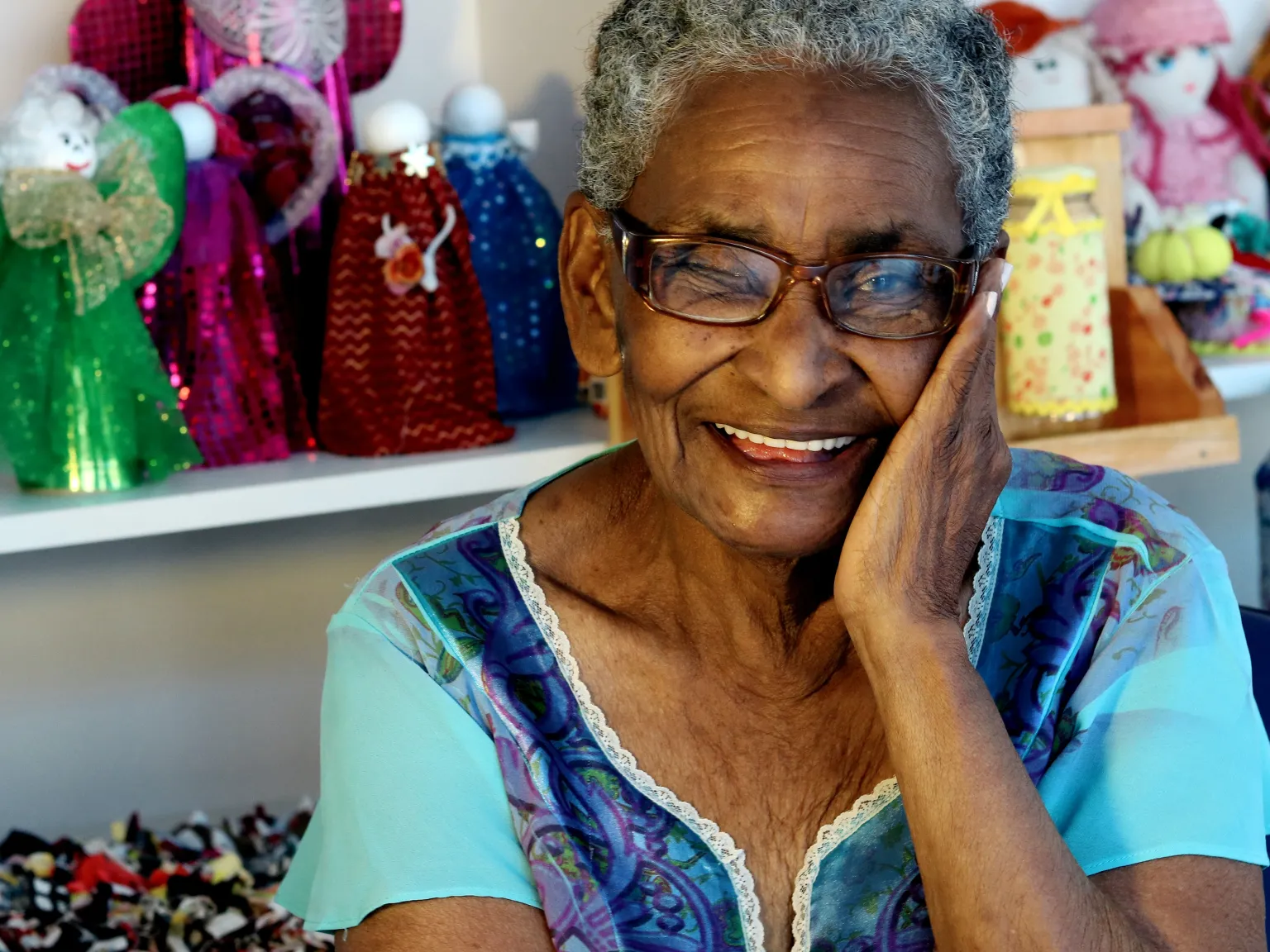 An elderly woman smiling