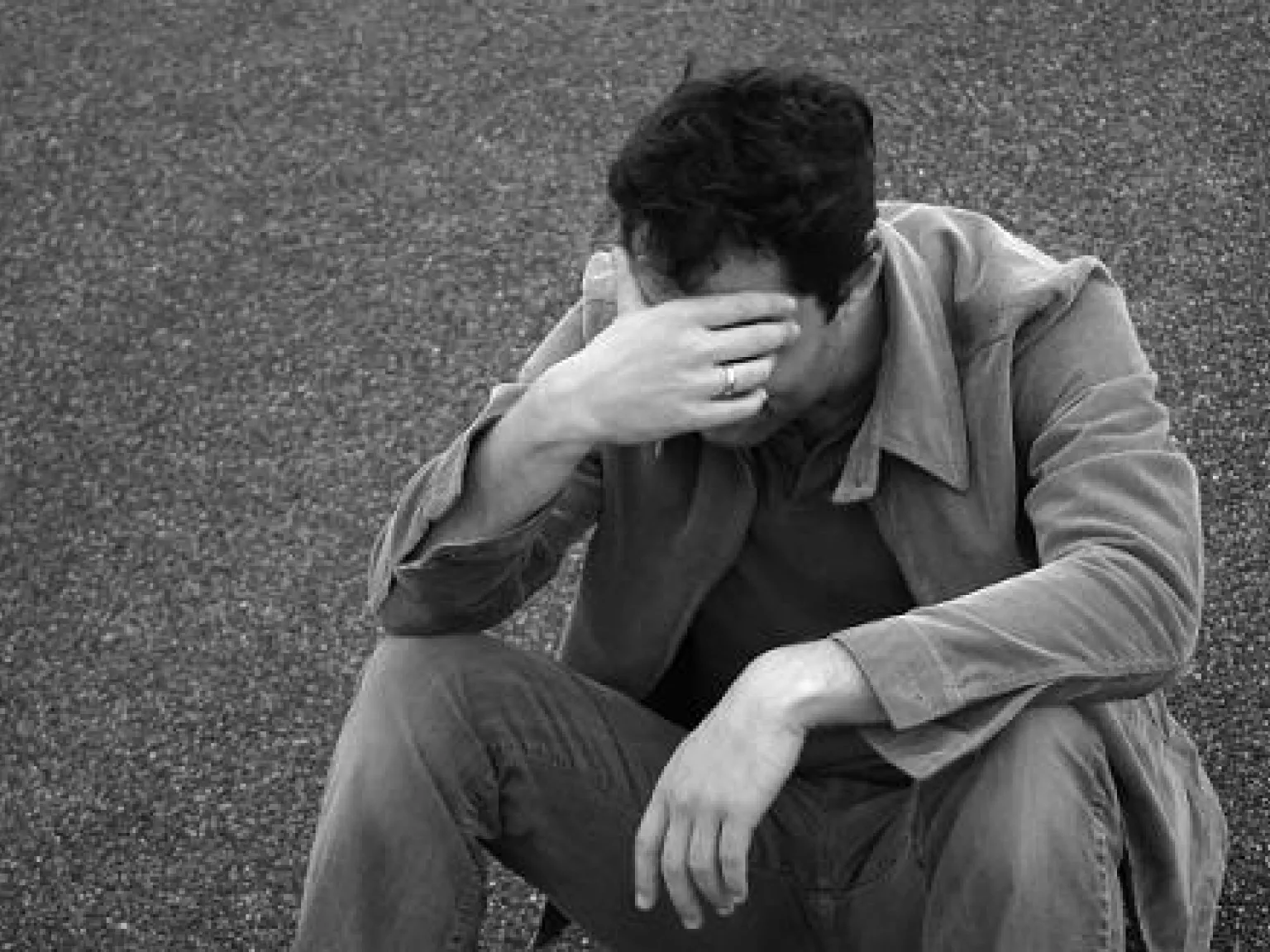 A man looking defeated 